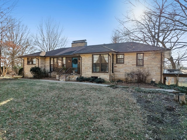 ranch-style home featuring a front yard