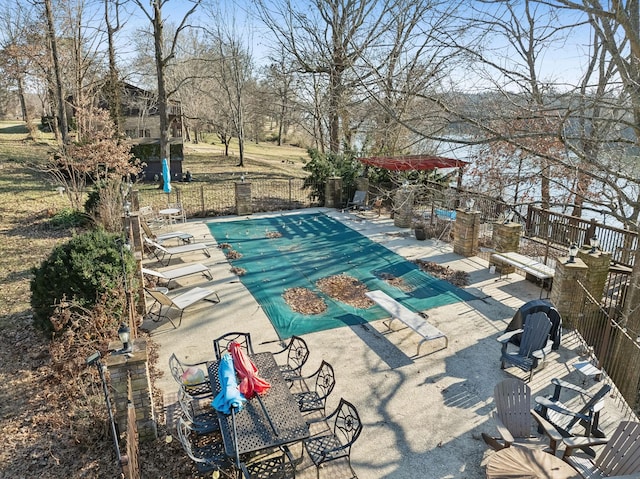 view of swimming pool featuring a patio