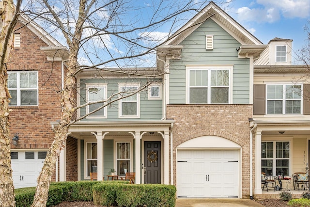 view of front of home featuring a garage and covered porch