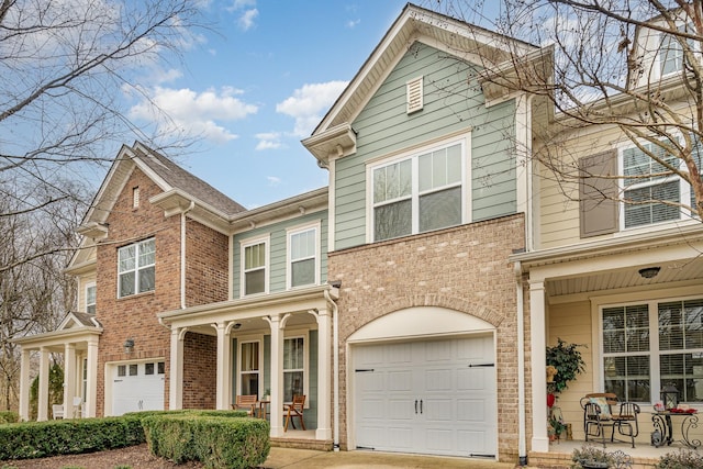 view of front of property with a garage and a porch