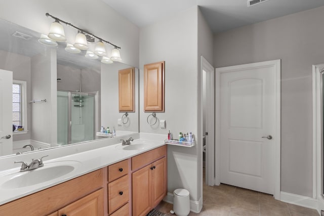 bathroom with vanity, tile patterned floors, and plus walk in shower