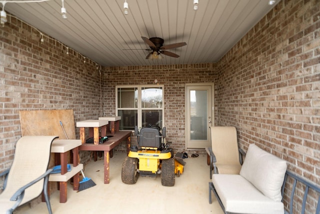 view of patio featuring ceiling fan