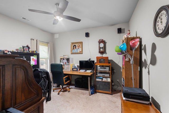 carpeted office with ceiling fan