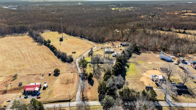 birds eye view of property featuring a rural view