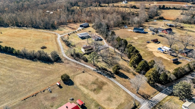 birds eye view of property featuring a rural view