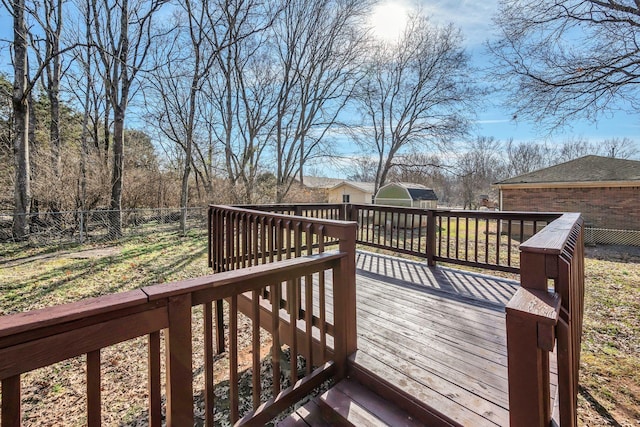 deck featuring a storage unit