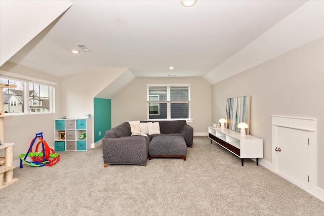 living room with light colored carpet and lofted ceiling