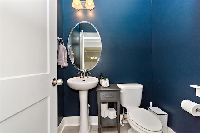 bathroom featuring sink and toilet