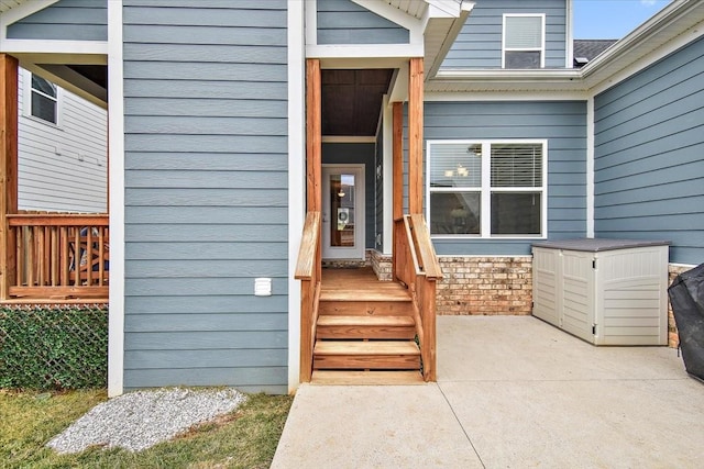 doorway to property with a patio area