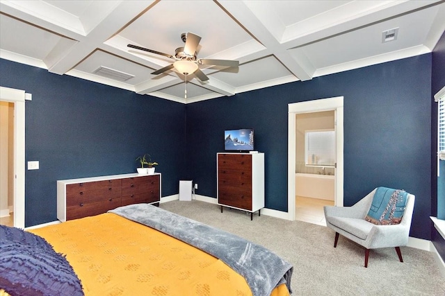 carpeted bedroom featuring coffered ceiling, ensuite bath, and beamed ceiling