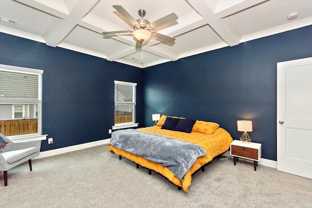 carpeted bedroom with ceiling fan, coffered ceiling, and beam ceiling