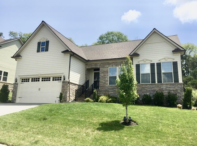 craftsman-style home featuring a garage and a front yard