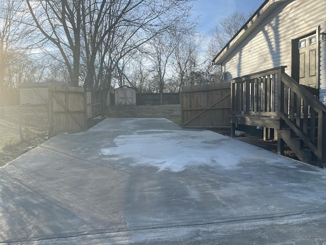 view of patio / terrace with a storage unit