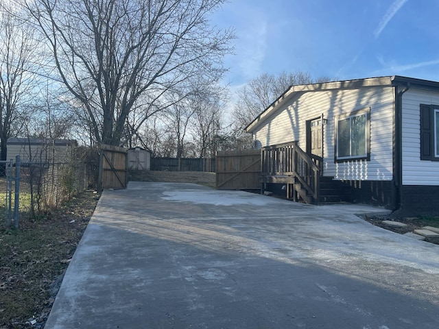 exterior space with a storage shed