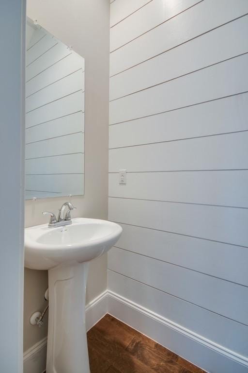 bathroom with sink and wood-type flooring