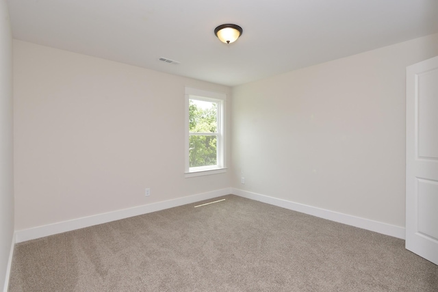 empty room with carpet floors