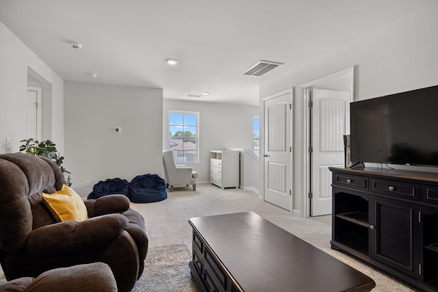 living room with light colored carpet