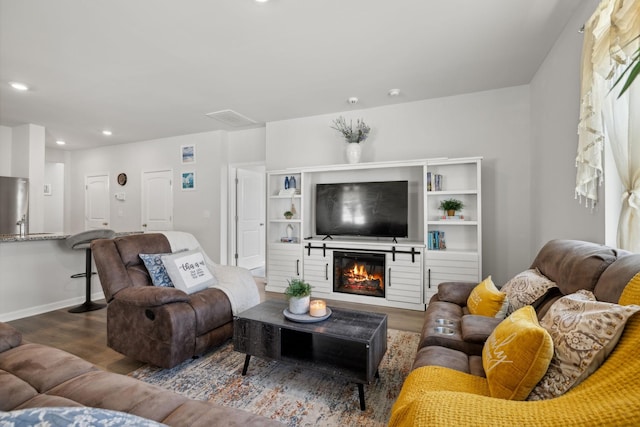 living room featuring dark wood-type flooring