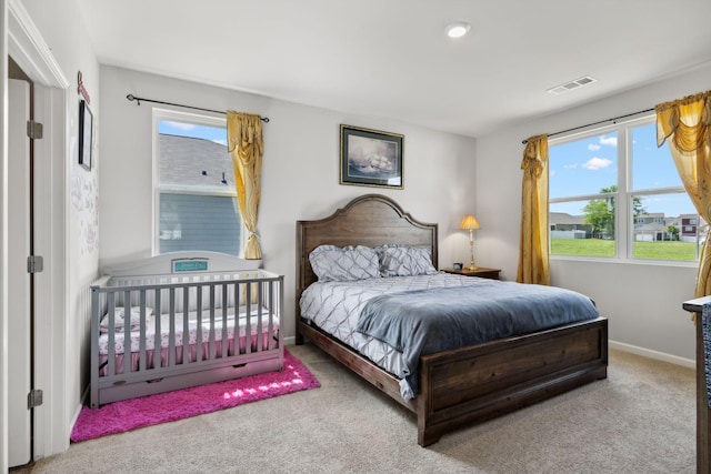 bedroom featuring carpet