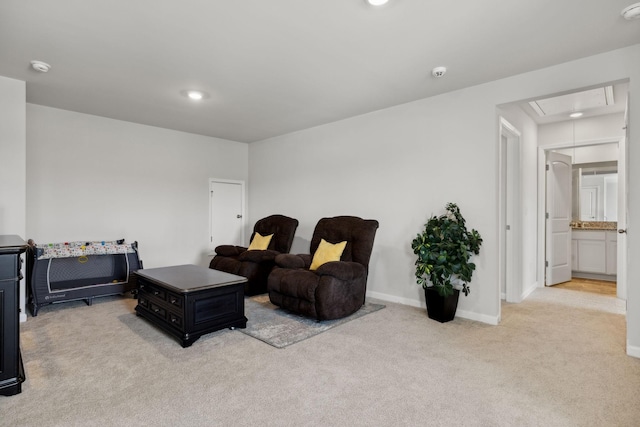 living room featuring light colored carpet