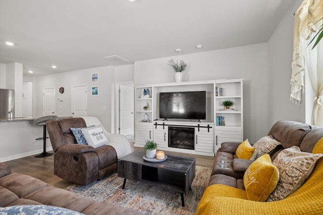 living room featuring dark hardwood / wood-style floors