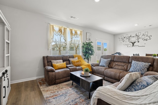 living room featuring dark hardwood / wood-style floors