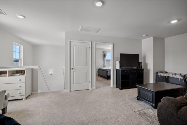 living room featuring light colored carpet