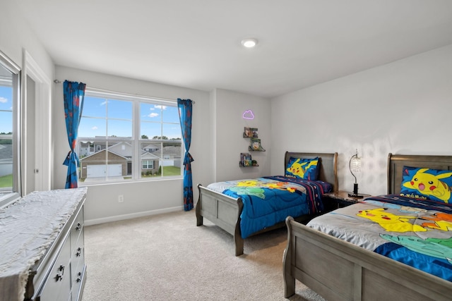 bedroom with light carpet