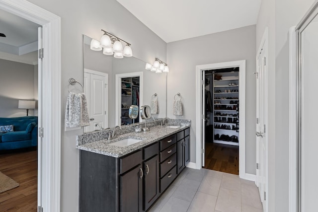 bathroom featuring vanity and hardwood / wood-style flooring