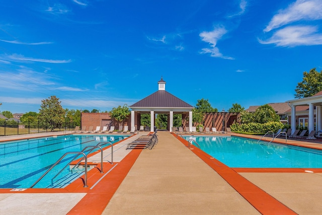 view of pool featuring a gazebo and a patio