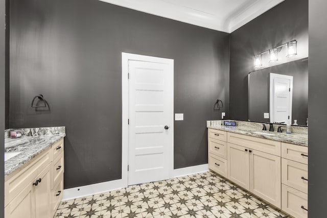 bathroom with vanity and ornamental molding