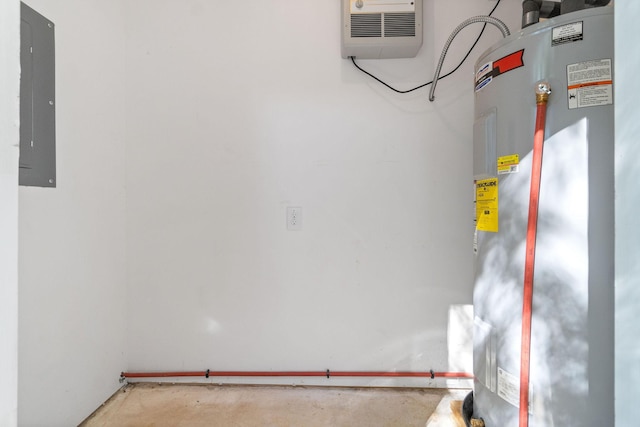 utility room with electric panel and water heater