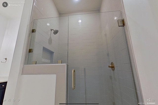 full bathroom with a stall shower