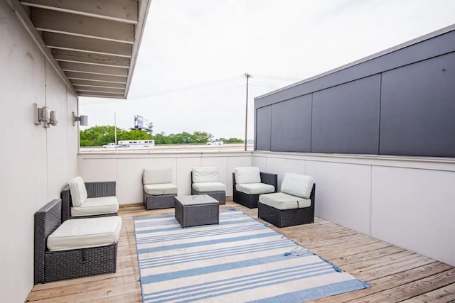 wooden deck featuring outdoor lounge area