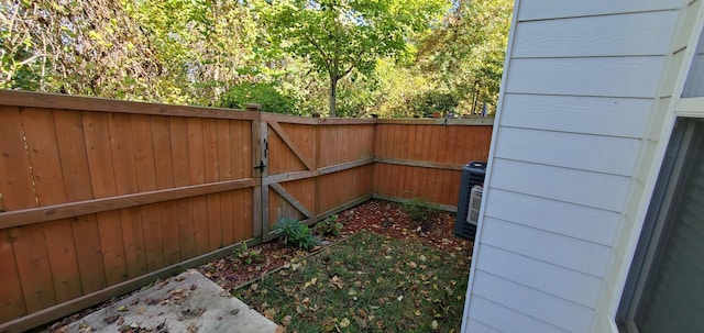 view of yard with central AC unit