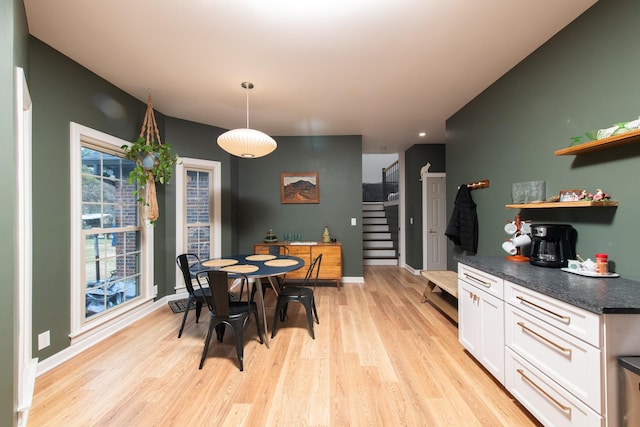 dining area with light wood-type flooring