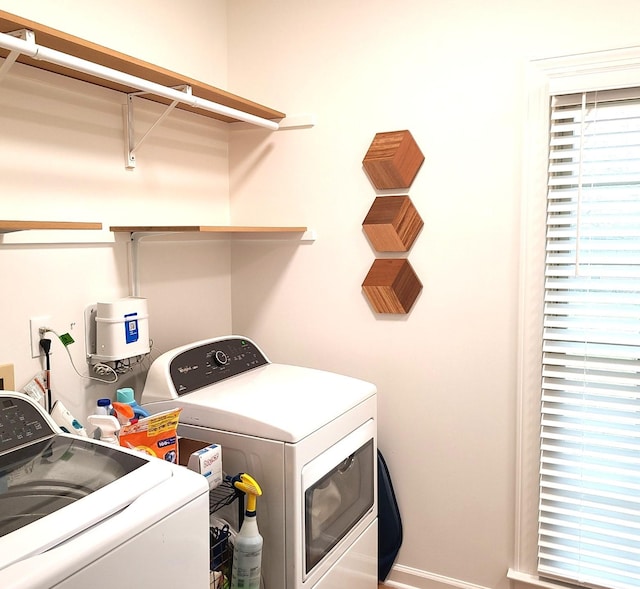 laundry area with washer and dryer