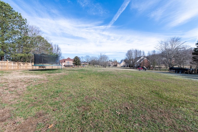 view of yard featuring a trampoline