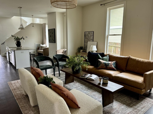 living room with dark hardwood / wood-style floors