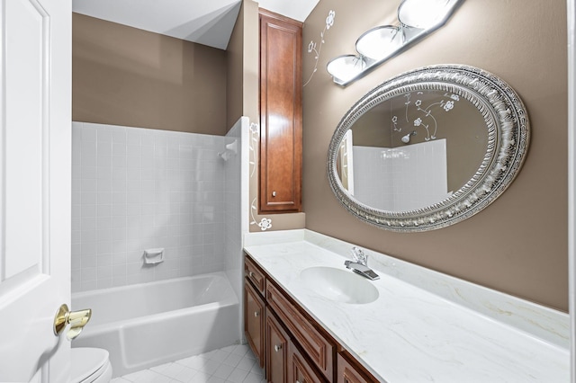 full bathroom with bathing tub / shower combination, toilet, vanity, and tile patterned floors