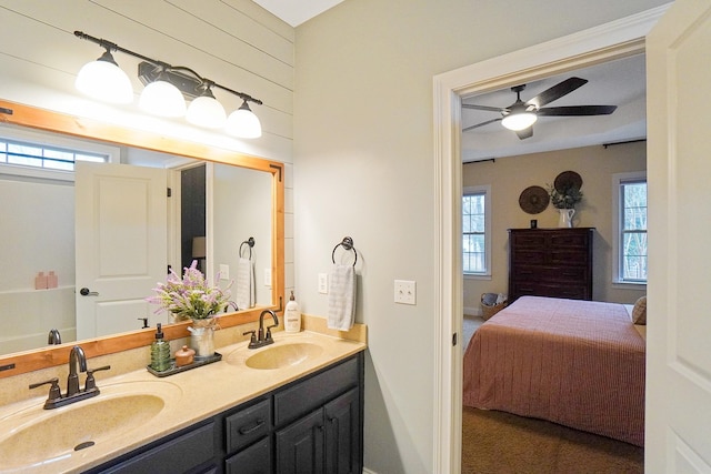 bathroom featuring vanity and ceiling fan