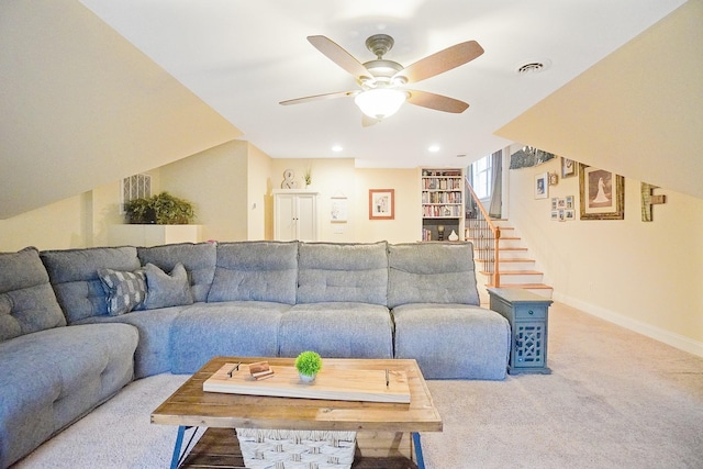 living room with carpet floors and ceiling fan