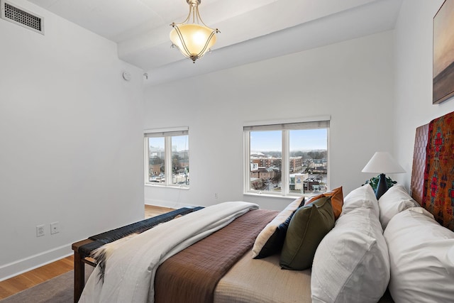 bedroom featuring hardwood / wood-style flooring