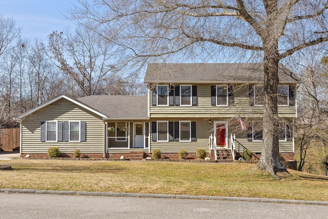 view of front of house with a front lawn