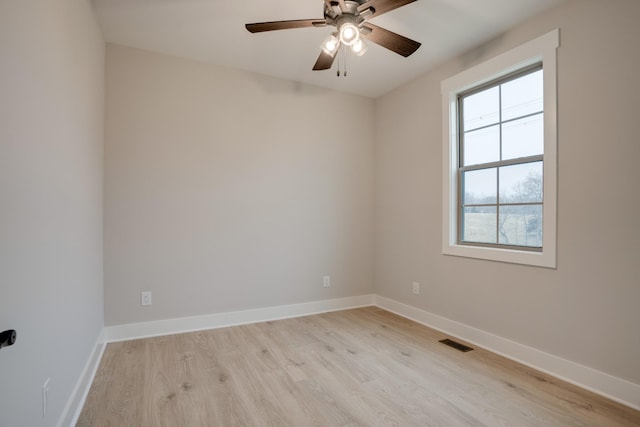 unfurnished room with ceiling fan and light hardwood / wood-style floors