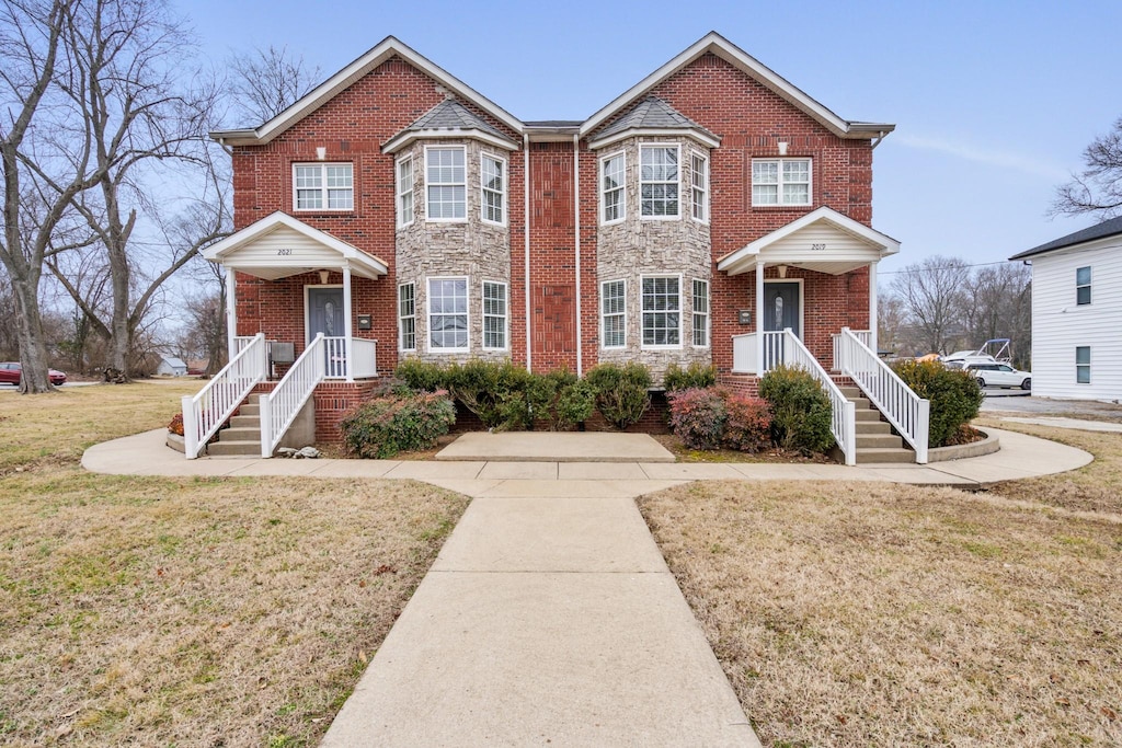 view of front of home with a front yard