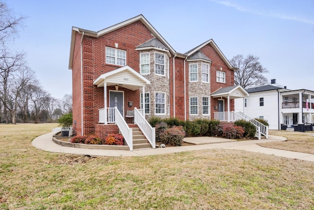 view of front of house with a front lawn