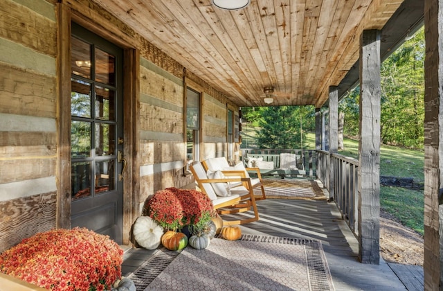 deck with covered porch