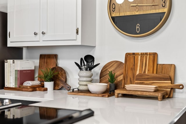 details featuring white cabinetry