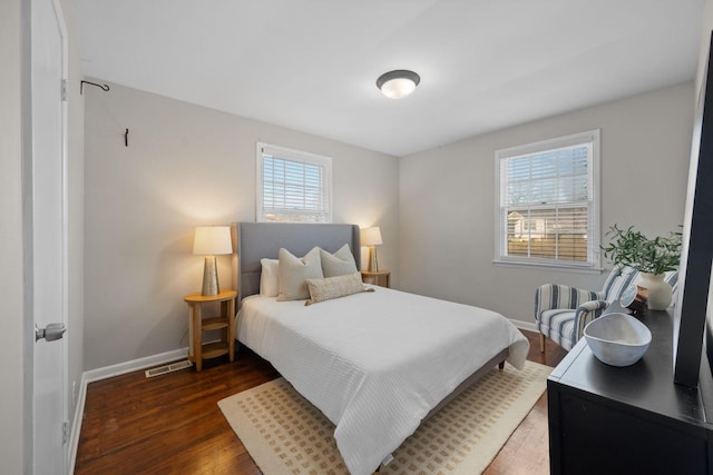 bedroom featuring dark hardwood / wood-style floors